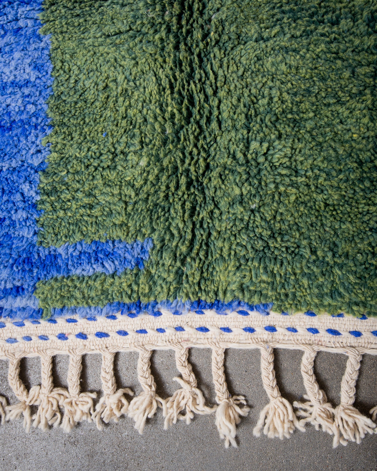 Modern, designer, handcrafted Berber rug from Morocco. Beniourain carpet with beautiful colours and patterns and fluffy wool texture.